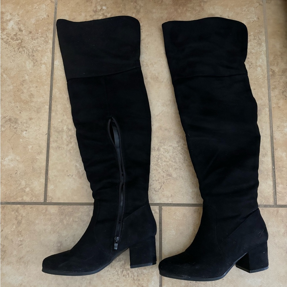 Tall black boots